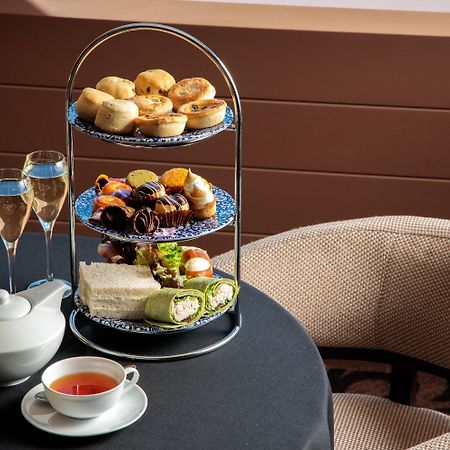 Intercontinental Adelaide By Ihg Hotel Exterior photo Afternoon tea at the InterContinental London Park Lane